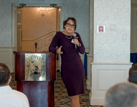 Program Executive Officer Cherie Smith speaks at the AFCEA luncheon