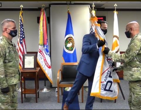 Passing of flag at AESIP/ARDAP change of charter ceremony