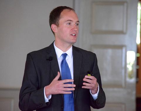 Jeremy Hiers gestures while speaking at AFCEA luncheon.