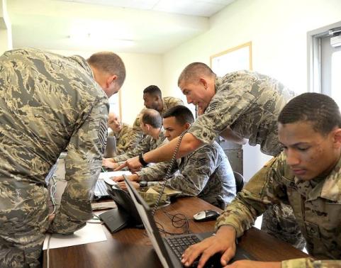 Service members collaborating