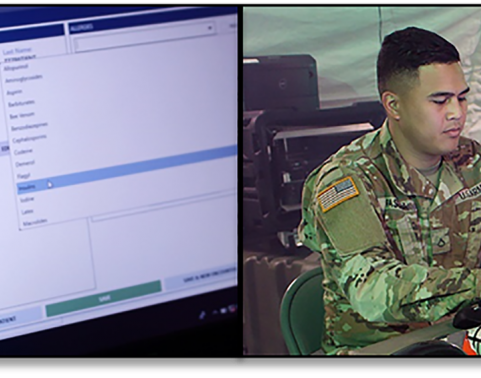 Soldiers work at a computer, using the new HALO app to transmit medical records electronically.