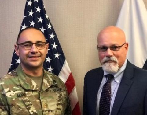 MAJ Mora (left) managed the day-to-day activities of the tech refresh at Fort Stewart, aided by Thomas “Karl” Brenstuhl (right), the project team assist.