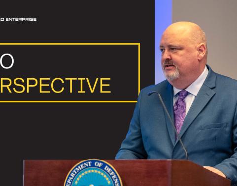 Program Executive Officer Bill Hepworth stands at a podium. The graphic reads, "PEO Perspective."