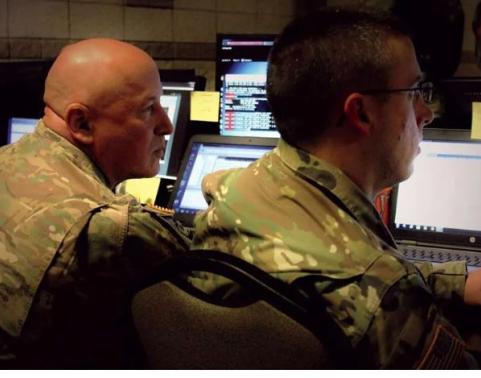 Soldiers working at computers
