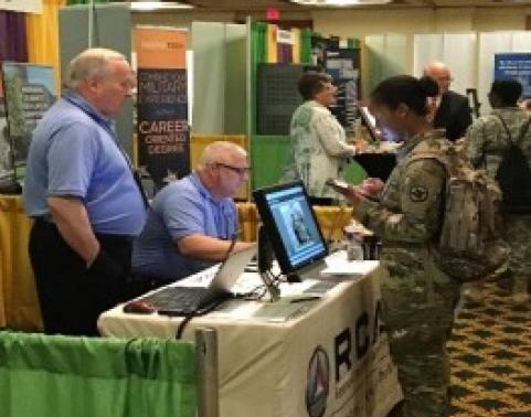 Pete Van Schagen and Jim Cook meet with an ARNG Soldier who is completing a quick RCAS Survey during the event. Photo provided by: Pete Van Schagen, RCAS Product Owner and Release Support team member.