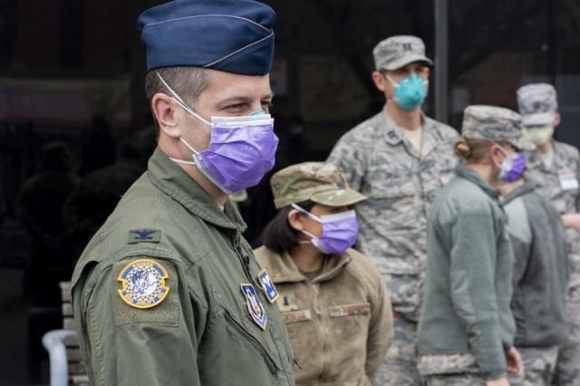 Col. Hans Otto, Air Force Aerospace Medicine Squadron, Wright-Patterson Base Air Force Base, Ohio, stands with fellow service members and health professionals transported to hard hit areas in support of DOD’s COVID-19 response in the Bronx, New York. U.S. Army North provided the military support to FEMA to help communities in need. April 8, 2020. U.S. Army photo by Photo Pfc. Nathaniel Gayle. 