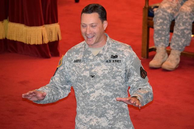 Soldier gestures while speaking.
